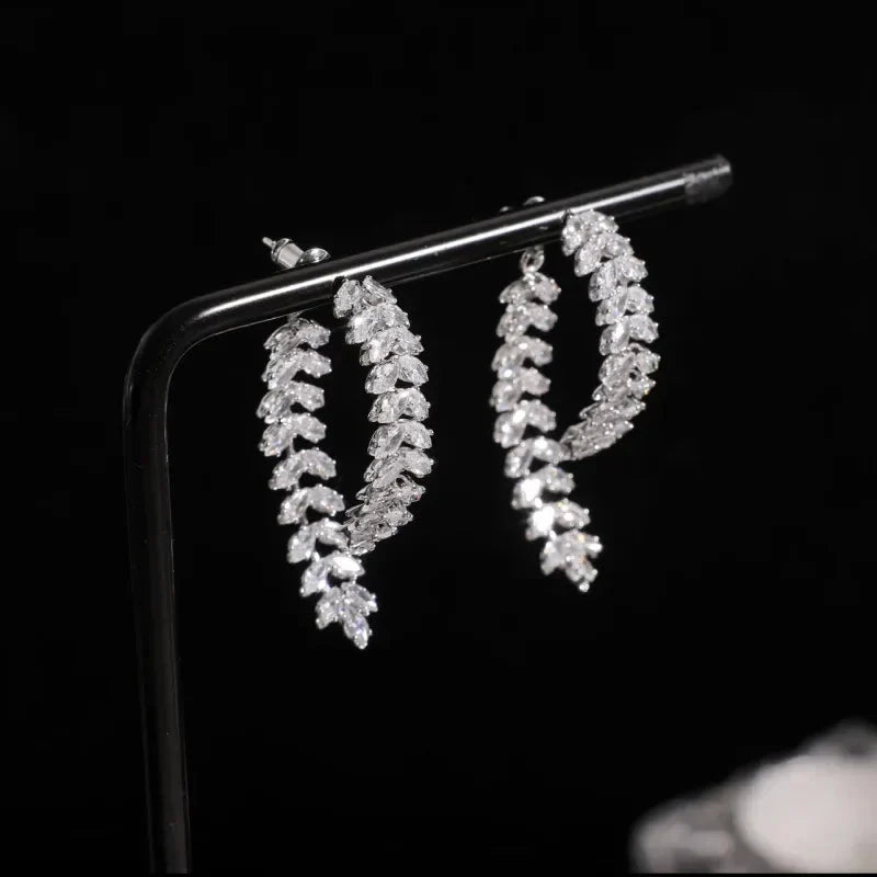 SHOWLU FASHION Zircon leaf stud earrings featuring Korean style copper jewelry with sparkling zircon accents and delicate leaf design.