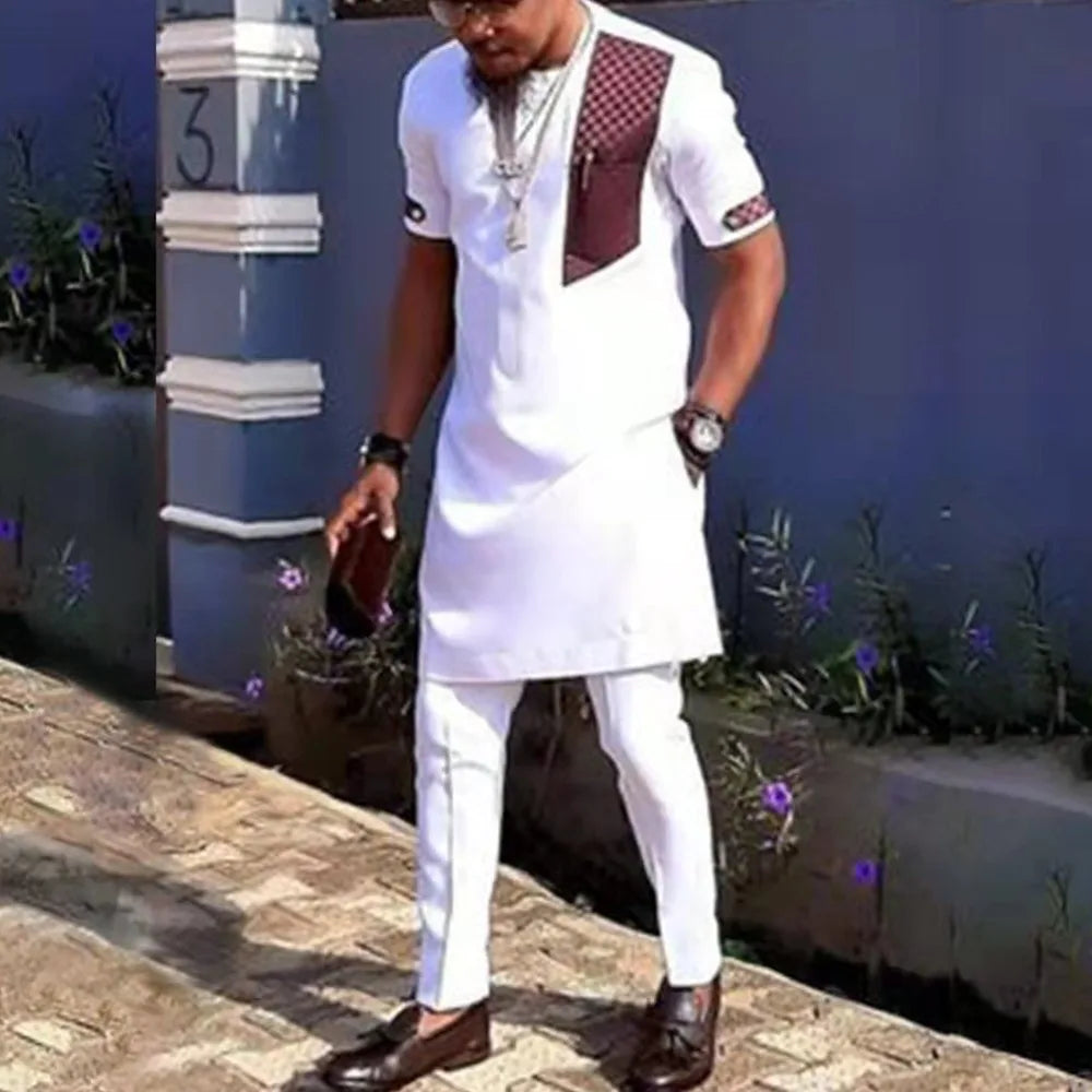 Showlu men's white Kaunda suit, traditional African 2-piece cotton set, featuring stylish design and comfortable fit.