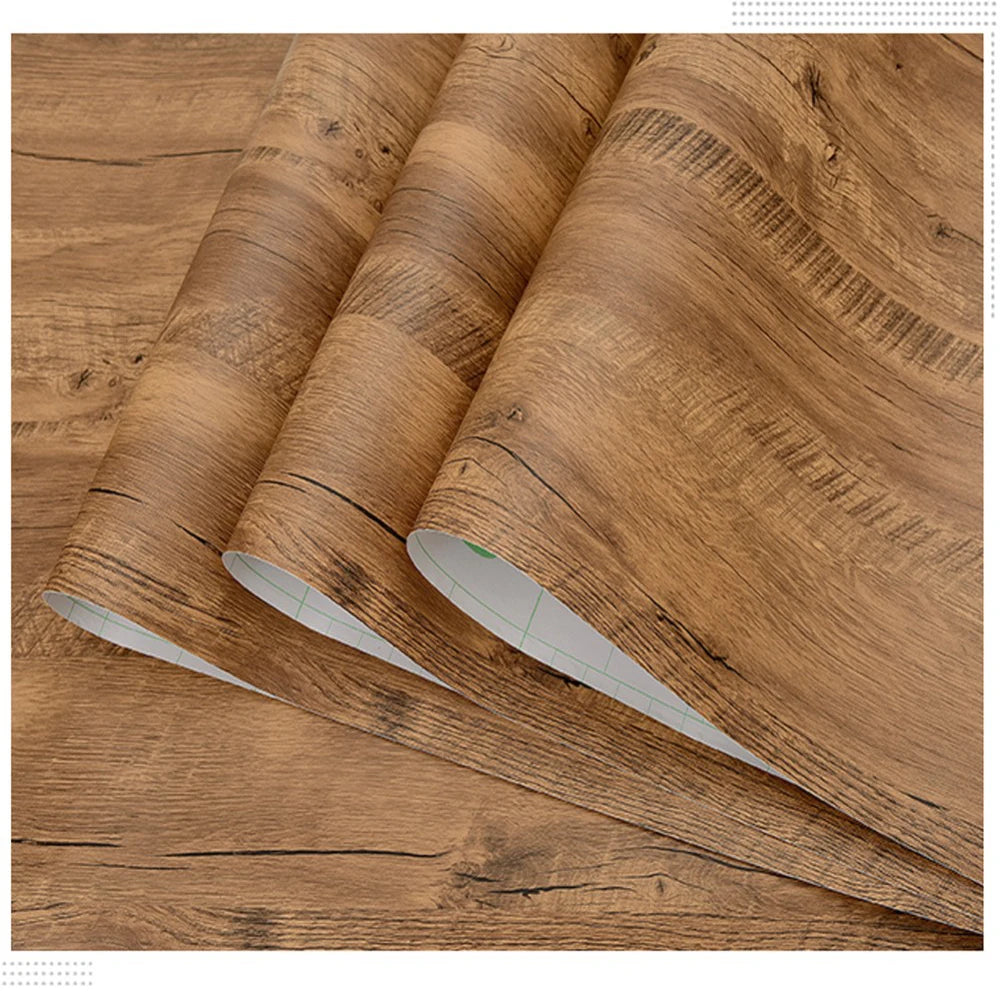 PVC waterproof self-adhesive wallpaper roll with wood grain design, ideal for furniture, walls, and home decor projects.