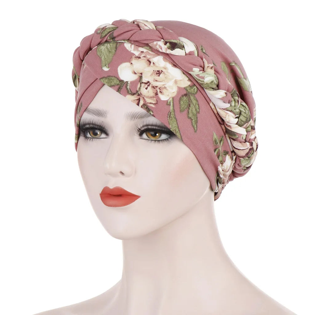 Leopard print silk scarf hat with flower accents, short braid style, suitable for Muslim women and hijab fashion by Showlu Fashion