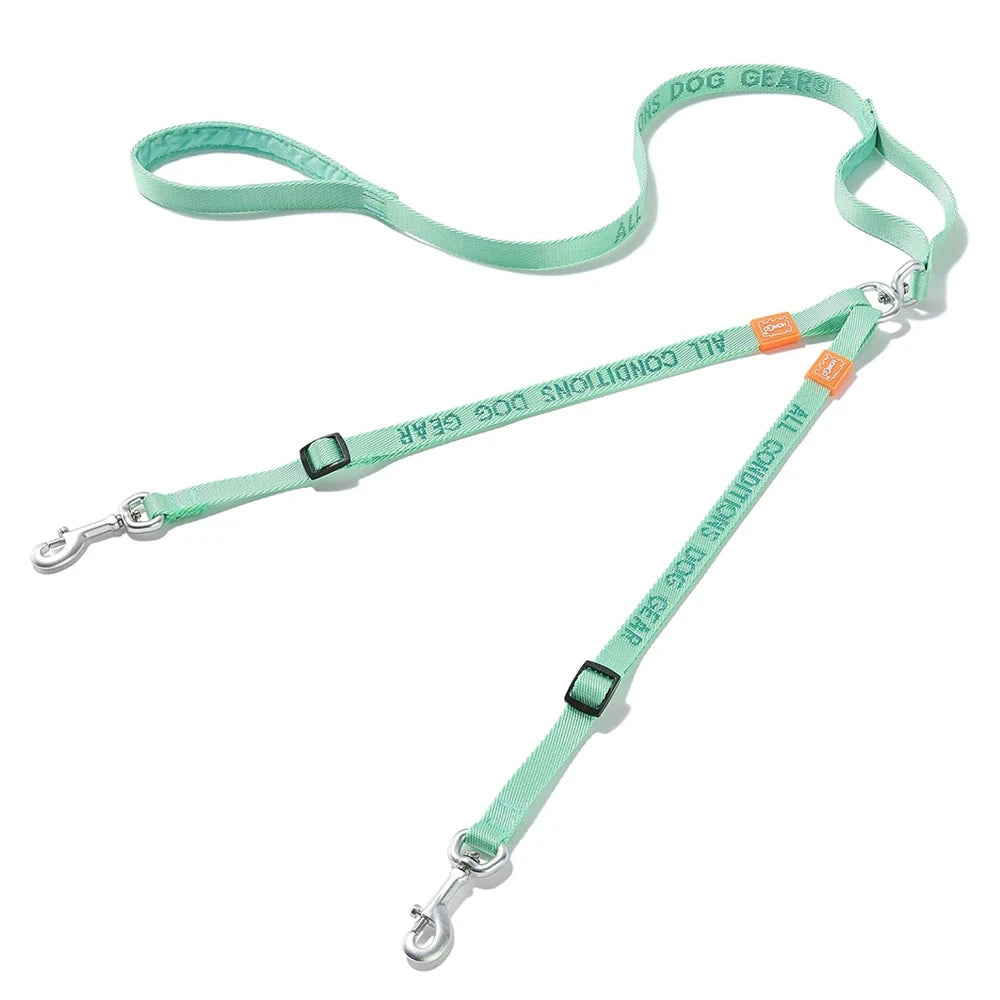 Double dog leash by Howgo, adjustable nylon dual lead coupler with no tangle design for walking two dogs simultaneously.