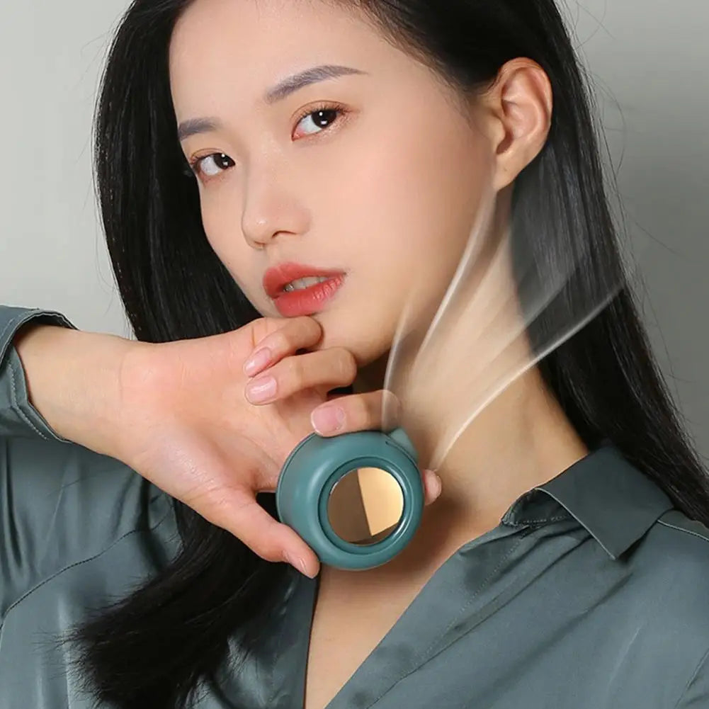 Showlu Smart General portable USB clip fan with 60-blade design, compact and lightweight for personal cooling.