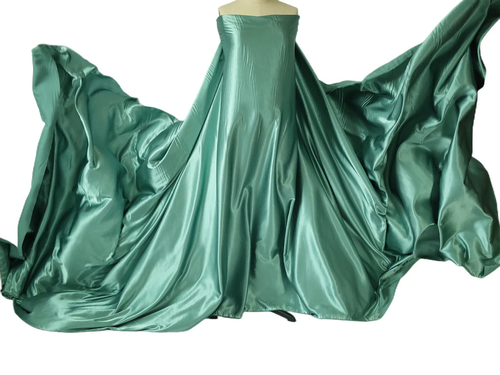 Showlu Maternity Silk Photography Gown in vibrant colors, designed for expecting mothers, featuring flowing fabric for elegant photos.