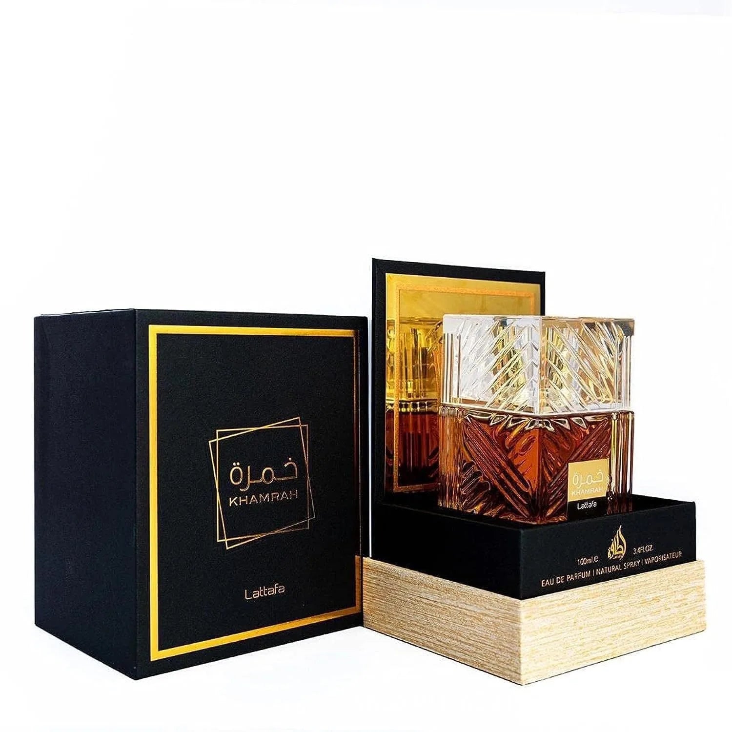 Lattafa Khamrah unisex perfume spray featuring warm vanilla and cinnamon notes, 100ml bottle.