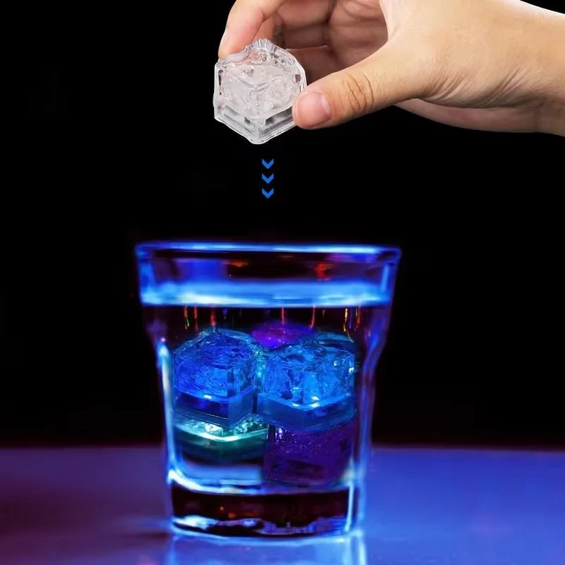 Set of six waterproof LED glowing ice cube lights by Showlu Smart for drinks, with vibrant colors and liquid sensor illumination.