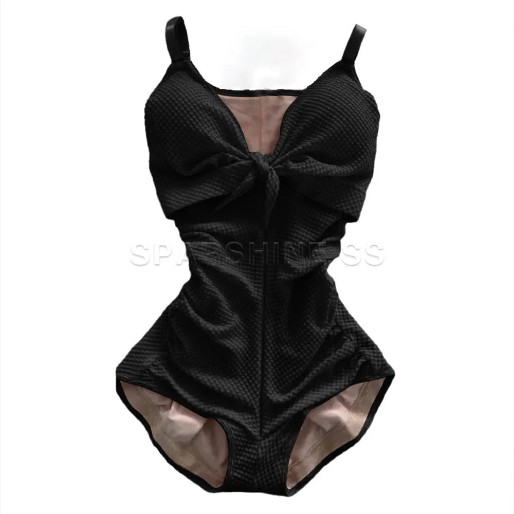 SHOWLU FASHION SS Women's Swimsuit Waist Trainer Slimming Shapewear thong, close-up of the sleek, black swimwear with waist cincher design.