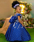 Lavender beaded queen ball gown for girls with intricate details and flowing fabric, designed for special occasions.