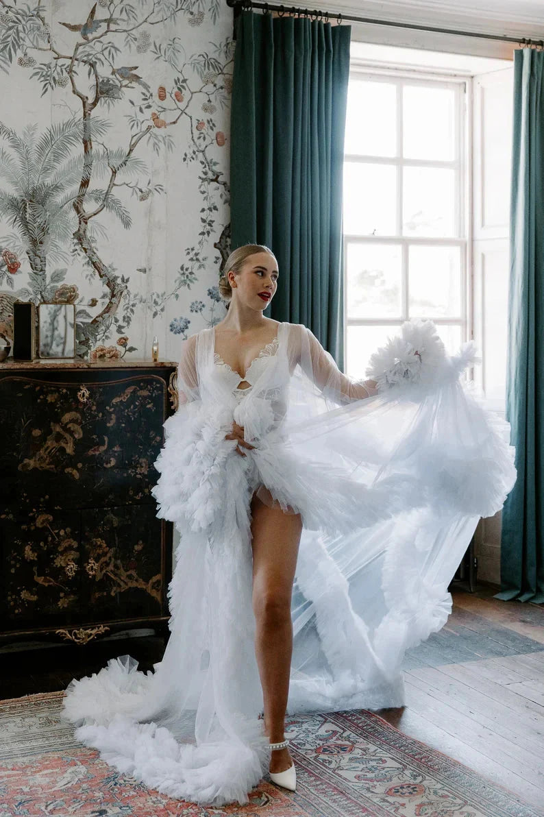 Boho tulle maternity bridal gown with ruffle dressing robe, showcasing soft, flowing fabric and elegant design.