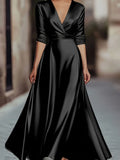Elegant Showlu V-neck long-sleeved evening gown featuring a French A-line floor-length design, displayed on a model.
