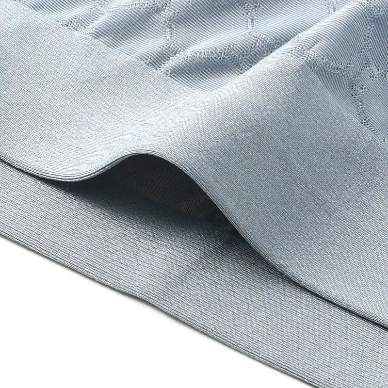 Men's ice silk boxer briefs by Showlu Fashion with seamless, breathable, summer-friendly design and slim fit for comfort.