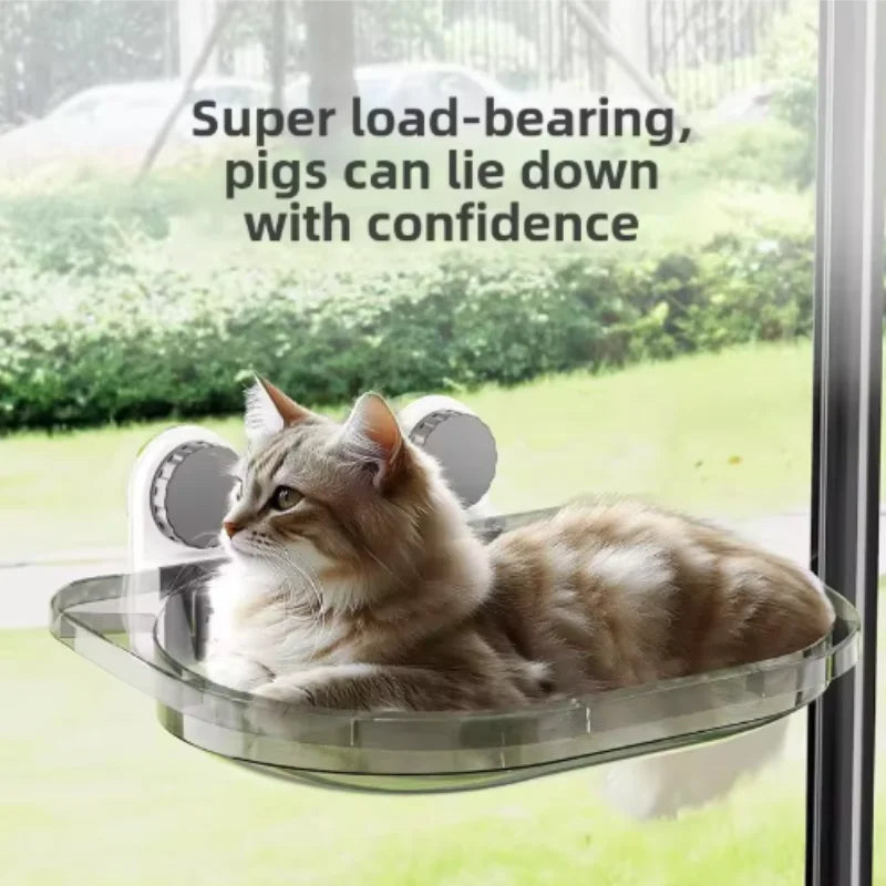 Showlu Smart General cat window hammock hanging on a window, providing a cozy perch for cats to enjoy sunlight and outside views.