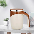 Rechargeable electric magnetic coffee stirring cup by Showlu Fashion, featuring a sleek design and built-in stirring mechanism.