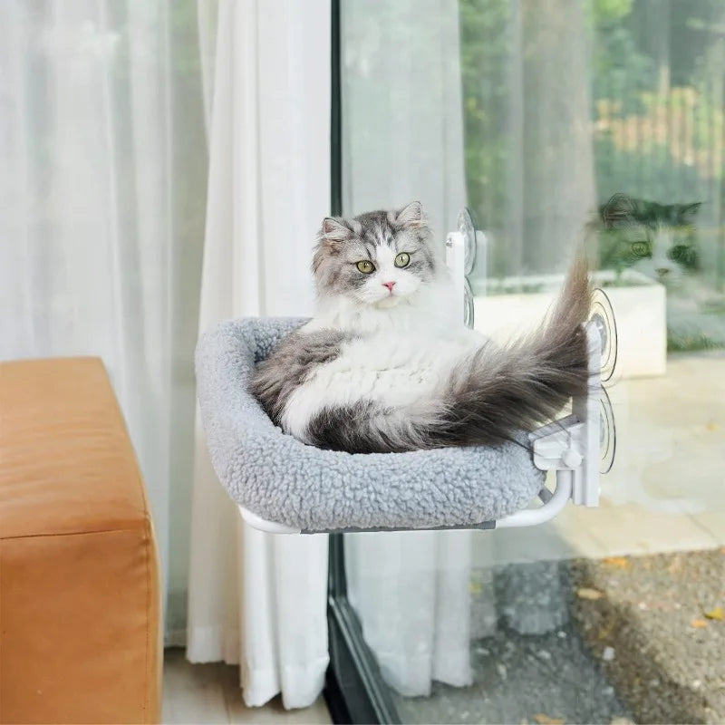 Foldable Showlu Cat Window Hammock with upholstered perch bed, providing a cozy, cordless perch for cats to relax by the window.
