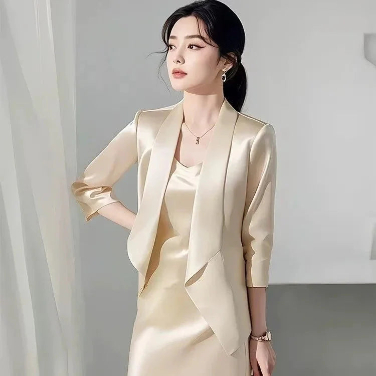Elegant satin two-piece set for women by SHOWLU FASHION, featuring an embroidered coat and matching midi skirt.