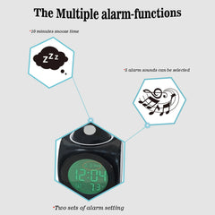A black digital alarm clock with a green LCD screen displaying the time and temperature.