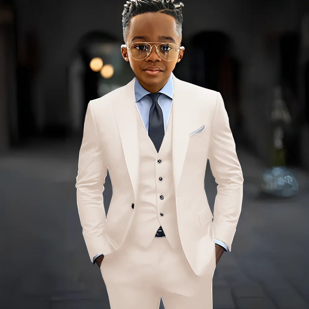 Dark grey boy's suit set with slim fit, single-breasted jacket, pants, and vest, featuring peak lapel for a formal look.