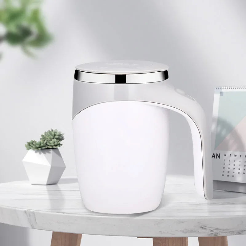Showlu automatic self-stirring coffee mug with stainless steel body, featuring a sleek design and easy-to-use stirring button.