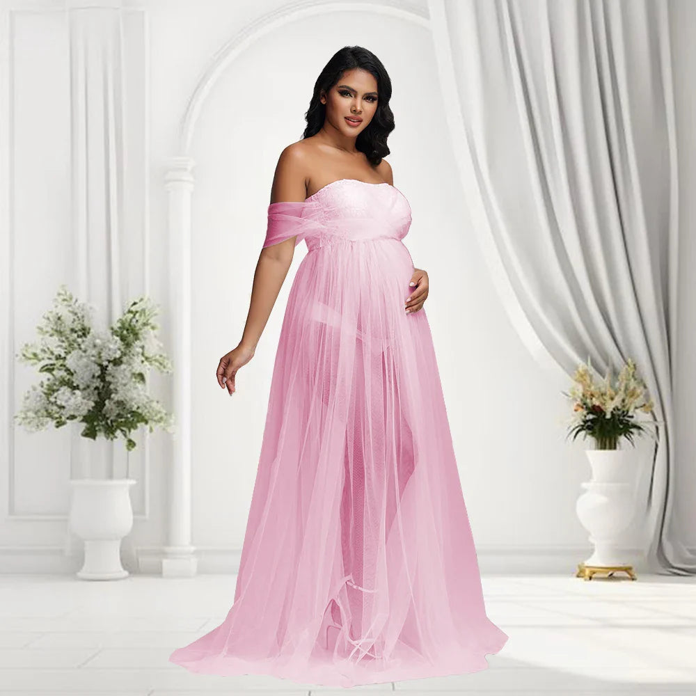Off-shoulder Showlu Lace Mesh Maternity Gown, elegant pregnancy photo dress with delicate lace details and flowing fabric.
