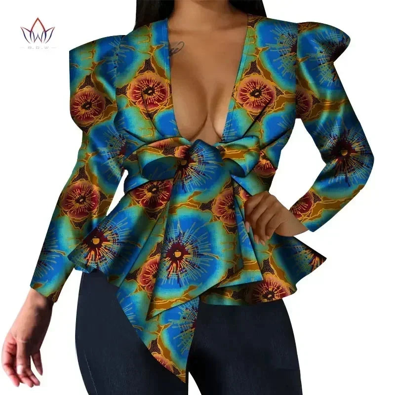 African print BintaRealWax women's dashiki cotton top with V-neck and long sleeves, featuring vibrant traditional patterns.