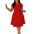 Plus size women's short sleeve midi dress in spring and summer street style, oversized fit, by Showlu Fashion Store.
