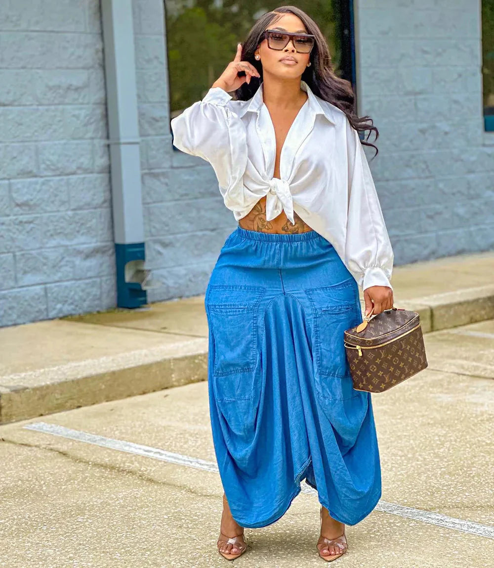 Women's loose casual solid long skirt with irregular hem, mid-calf length, in lightweight fabric, by SHOWLU FASHION STORE.
