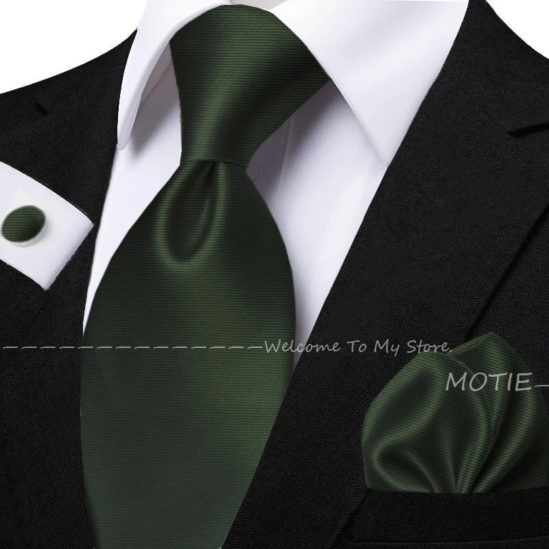 Men's sage green tie set with pocket square, flower brooch, and cufflinks for wedding or daily wear, showing elegant collar accessories.