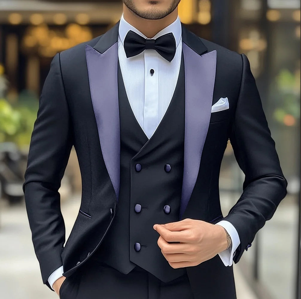 Black men's groom wedding tuxedo 3-piece suit with slim fit jacket, vest, and pants featuring peak lapel for formal occasions