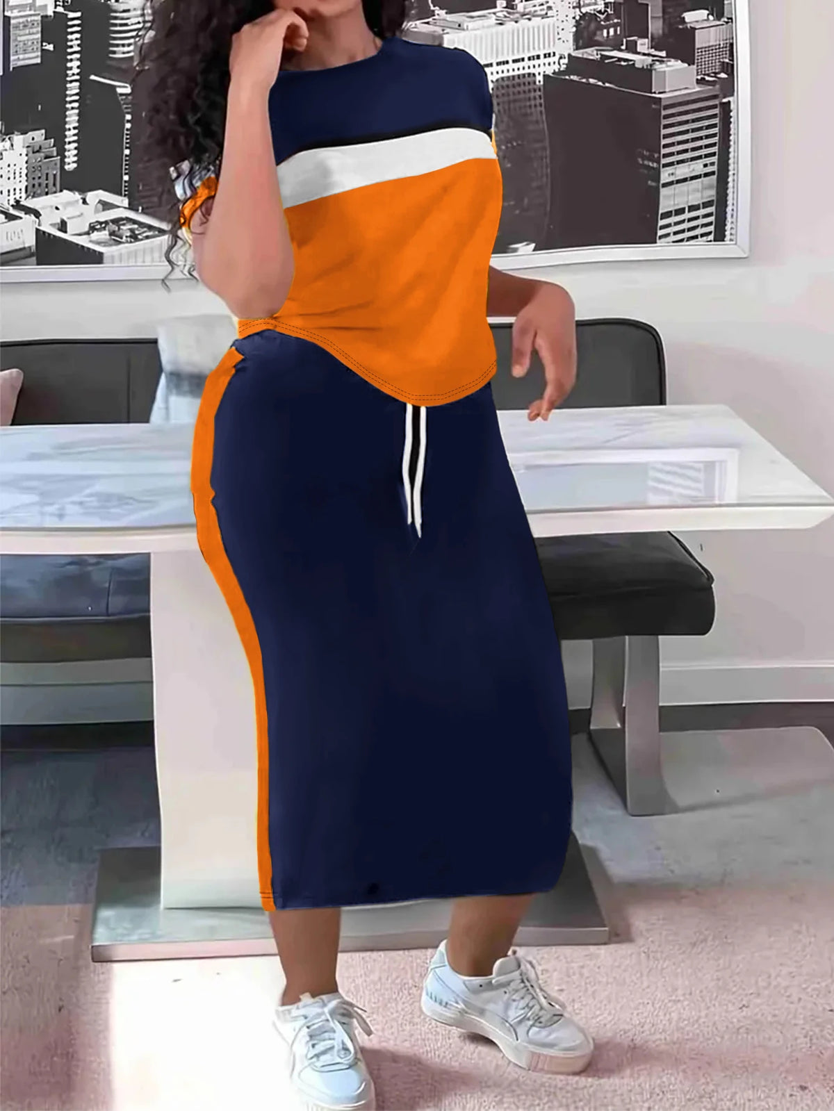 Color blocking casual two-piece set by Showlu Fashion featuring comfortable, versatile fashion with bold splicing design.