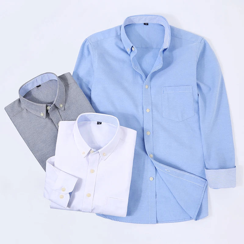 Showlu Men's slim fit oxford shirt with long sleeves, non-iron casual top in classic blue fabric, displayed on a hanger.