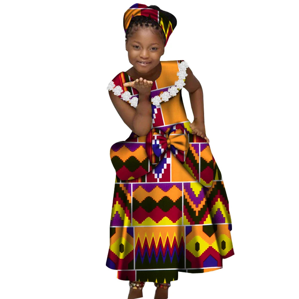 African Ankara print girl's dress with cotton Kente pleated skirt by Wingfei, featuring vibrant colorful patterns and a stylish design.