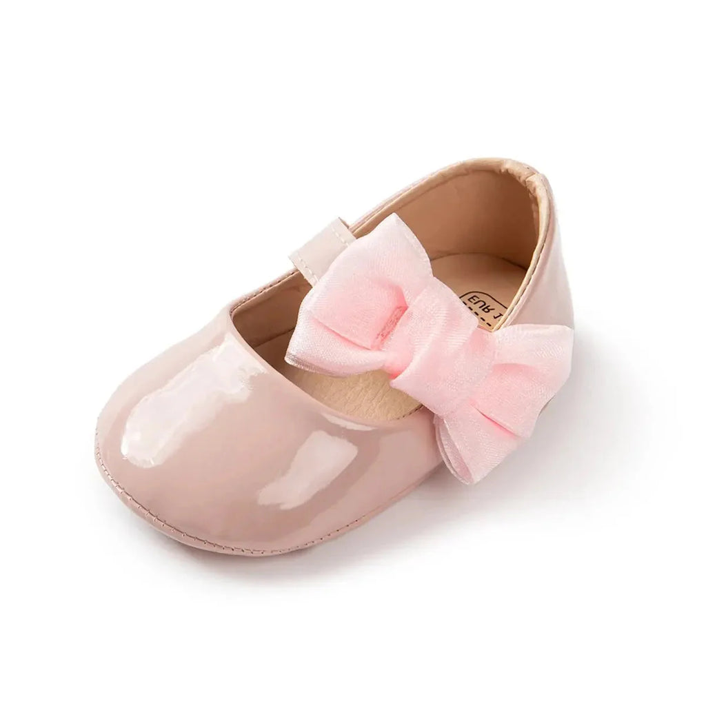 Showlu Fashion Store Meckior baby girls PU leather bowknot shoes with non-slip soles, perfect for first walkers.