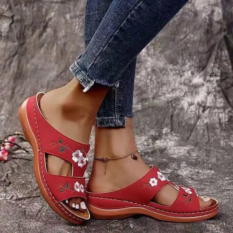 SHOWLU Women's embroidered flower leather wedge sandals with summer design, featuring floral embroidery and comfortable wedge heels.
