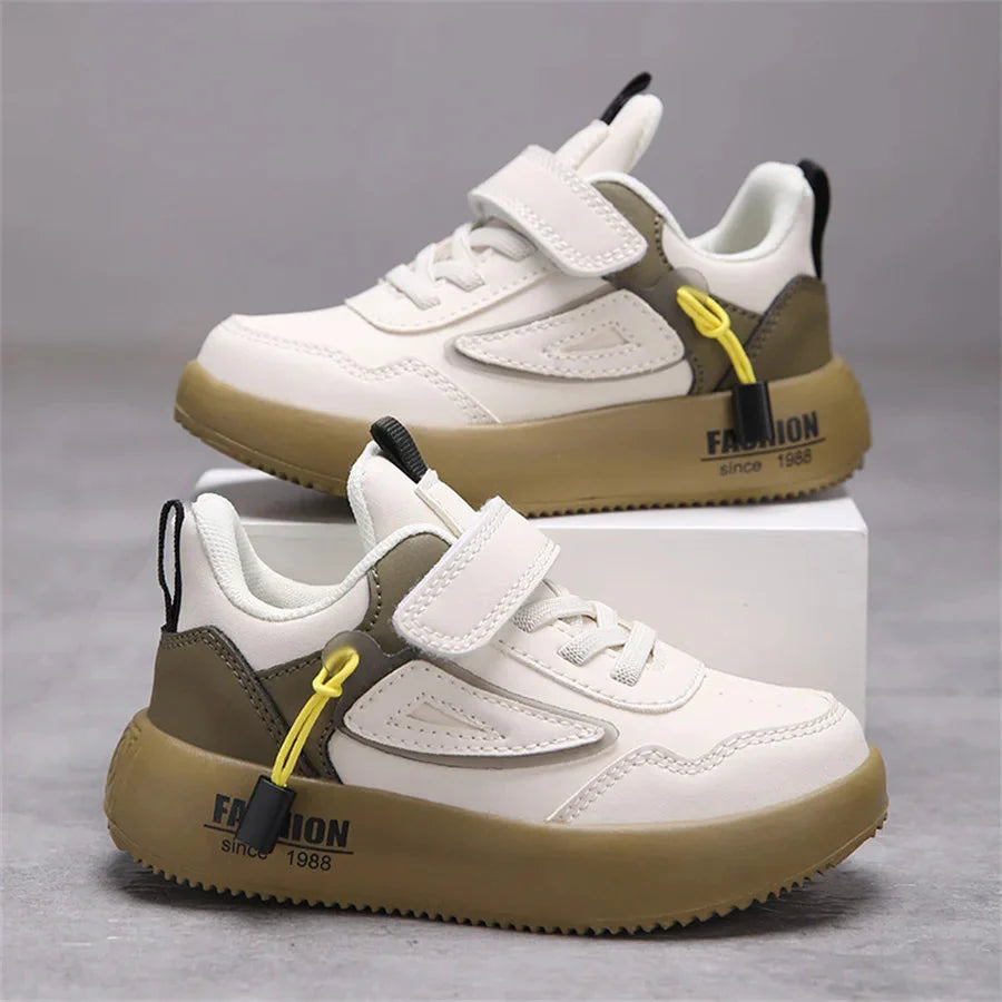 Kids white leather sneakers by SHOWLU FASHION STORE featuring breathable, unisex casual sports shoes with stylish design.