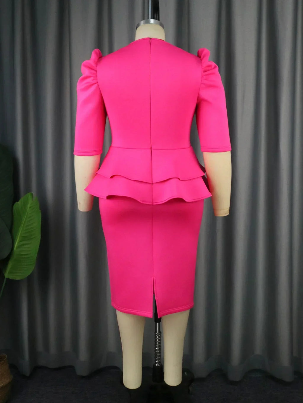 Elegant plus size church dress for women with ruffle peplum waist, V-neck sheath style, suitable for formal events and weddings.