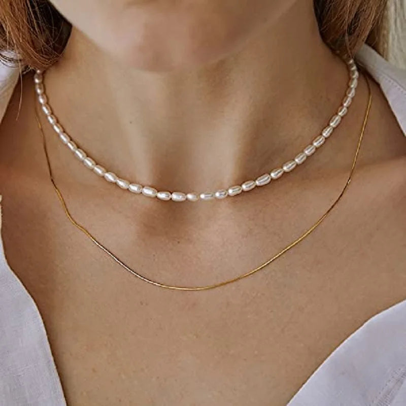 Hengsheng White Freshwater Pearl Choker Necklace with 5-7mm oval pearls, showcasing a elegant jewelry piece with lustrous white pearls.