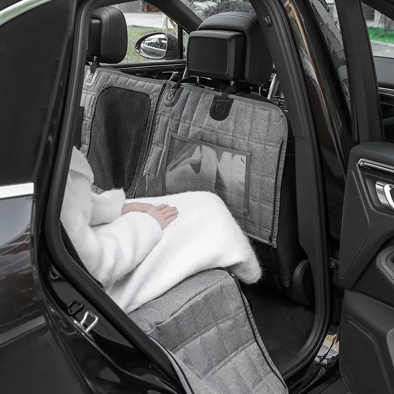 Showlu Waterproof Dog Car Seat Cover in plaid nylon, designed as a pet travel hammock for car safety and comfort.