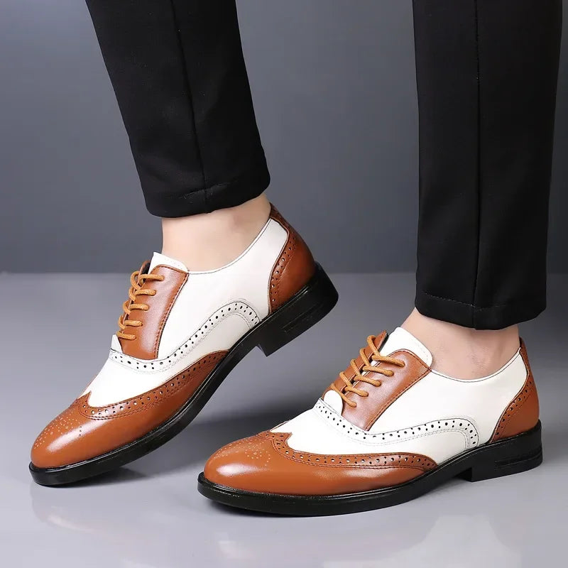 Classic men's lace-up dress shoes with point toe design, showing a formal, business casual style in black leather.