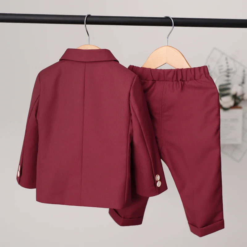 Children's formal burgundy suit set with jacket, pants, and vest for boys, suitable for birthdays and winter occasions.