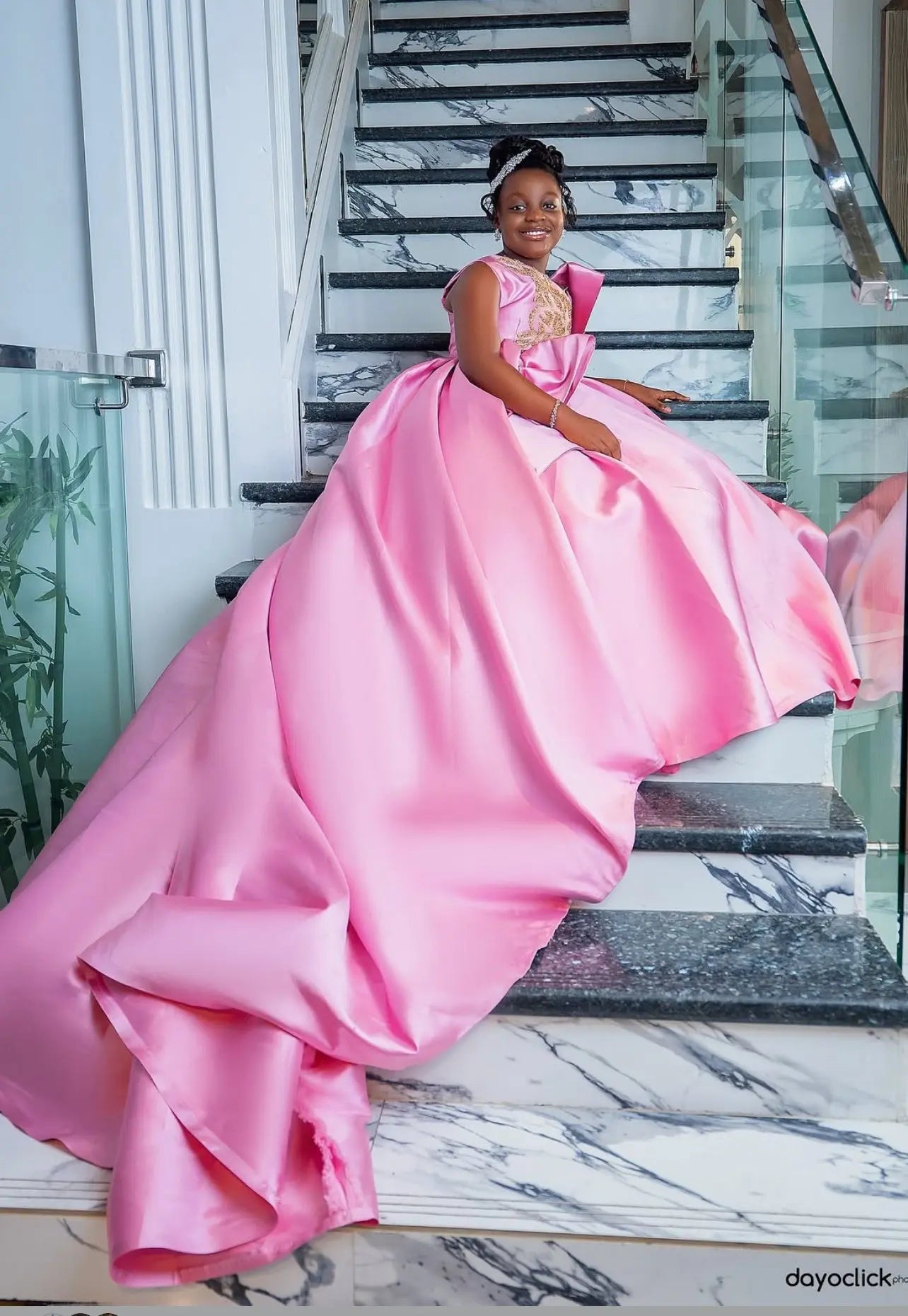 Custom luxury pink satin ball gown by 1170uf-he featuring beaded floral embellishments and a flowing skirt for flower girl attire.