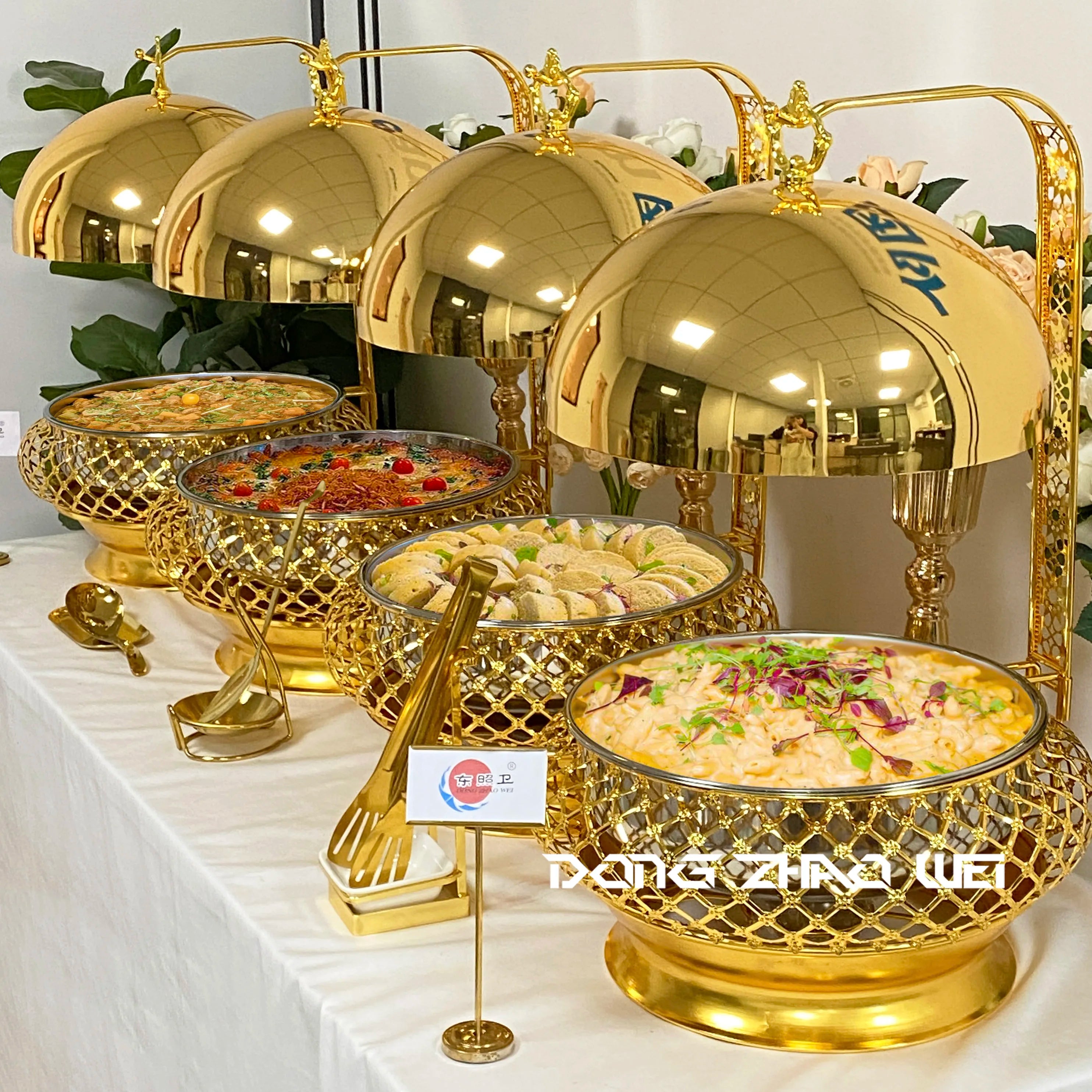 Stainless steel wedding party chafing dish with hanging lid, perfect for buffet food warming and catering events.