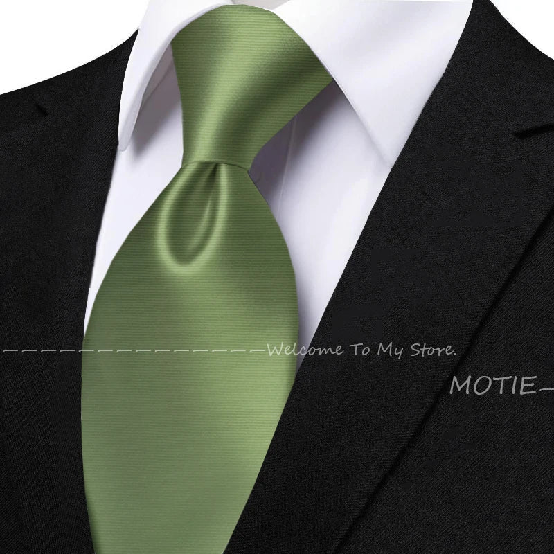 Men's solid sage green tie set with pocket square, flower brooch, cufflinks, and collar accessory for wedding or daily wear.