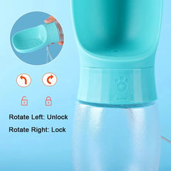 A portable teal pet water bottle with a built-in bowl and a locking mechanism.