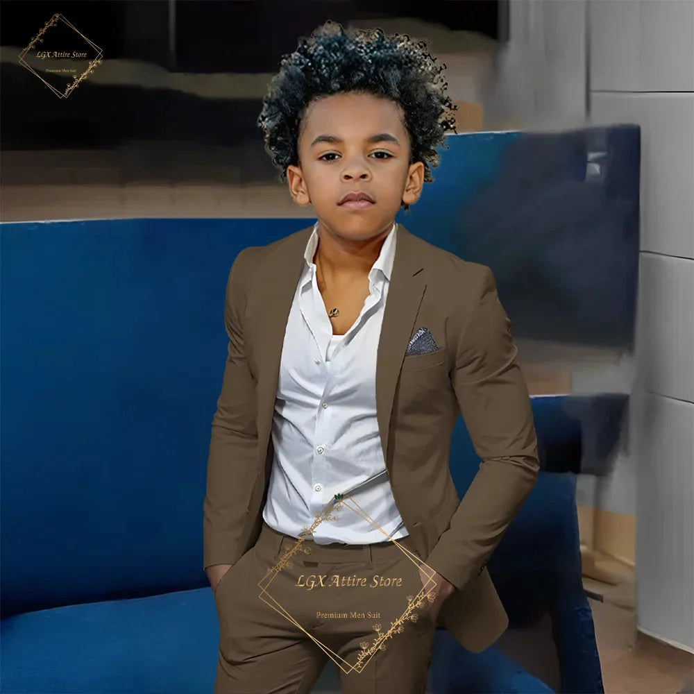 Boy wearing SHOWLU FASHION STORE orange slim fit 2-piece suit with single-breasted twill jacket and matching pants.