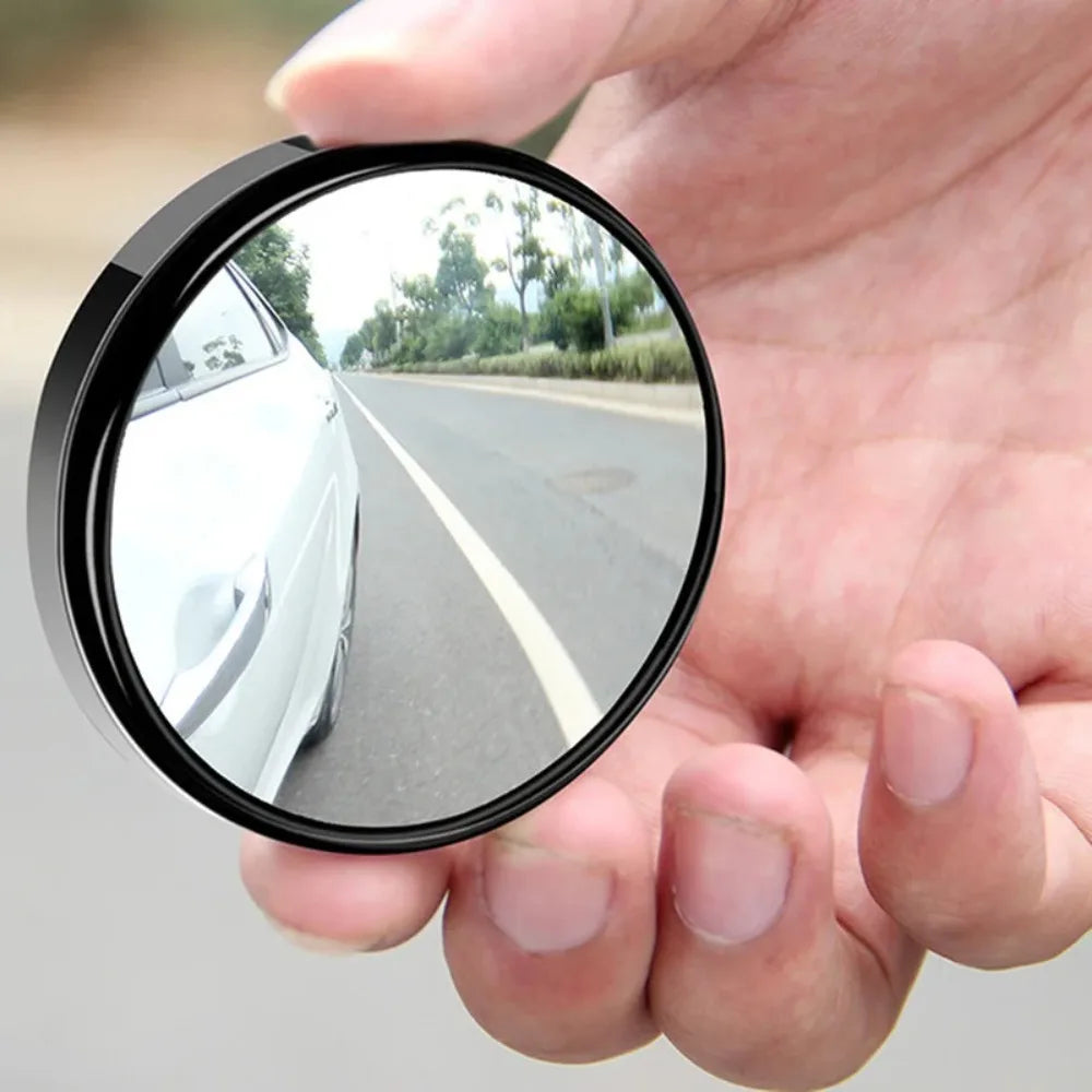 Showlu Smart General Car Blind Spot Mirror Pro attached to vehicle side mirror, enhancing visibility and safety while driving.