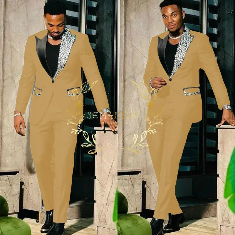 Black men's slim fit suit with single breasted blazer and matching pants, featuring peak lapel, suitable for prom or formal events.