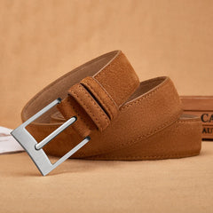 A tan suede leather belt for men and women featuring a classic silver pin buckle.