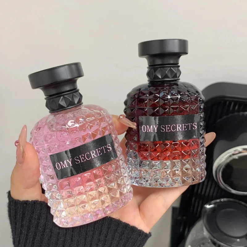 Showlu Fashion Rivet Series Floral EDT perfume bottle, 100ml long-lasting fragrance with elegant floral design.