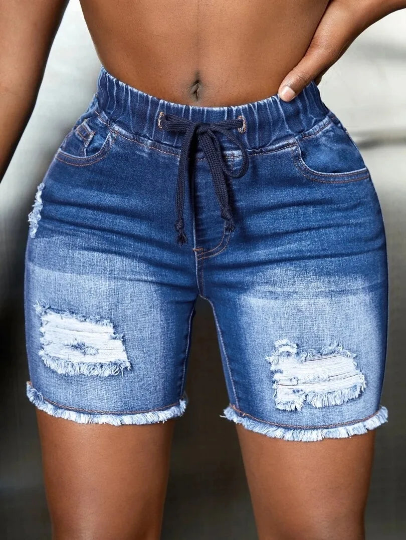 High waist ripped denim shorts with tassels for women, stylish and casual by ANGELHAOHAOYACN, featuring distressed details and fringe accents