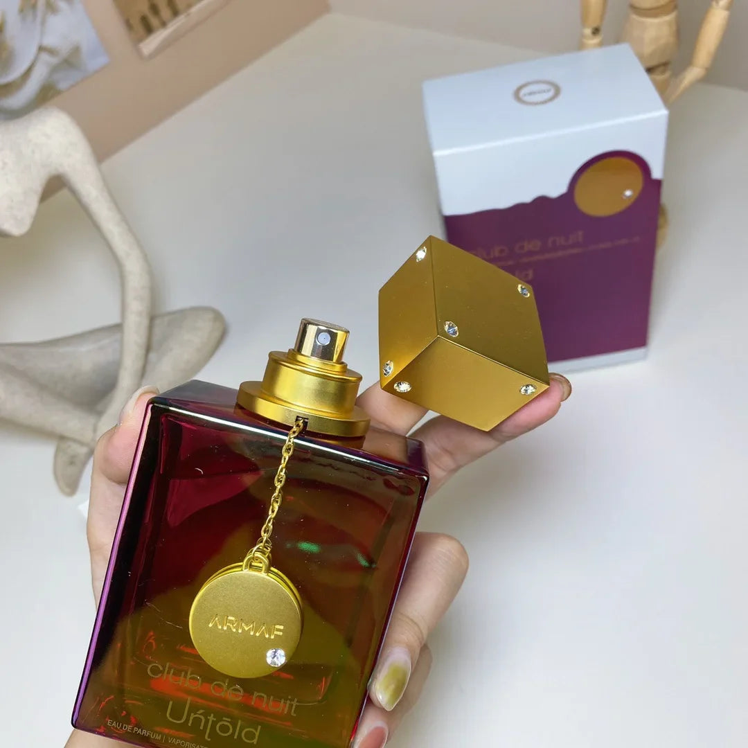 Armaf Club De Nuit Intense unisex oriental woody perfume bottle, 3.6oz, with elegant packaging and sleek design.