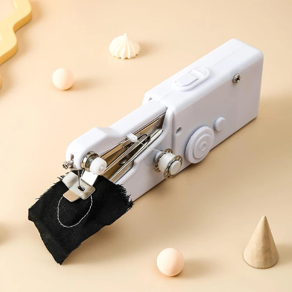 Mini handheld sewing machine by Showlu Smart General, compact design with sewing needle and controls visible in the image.